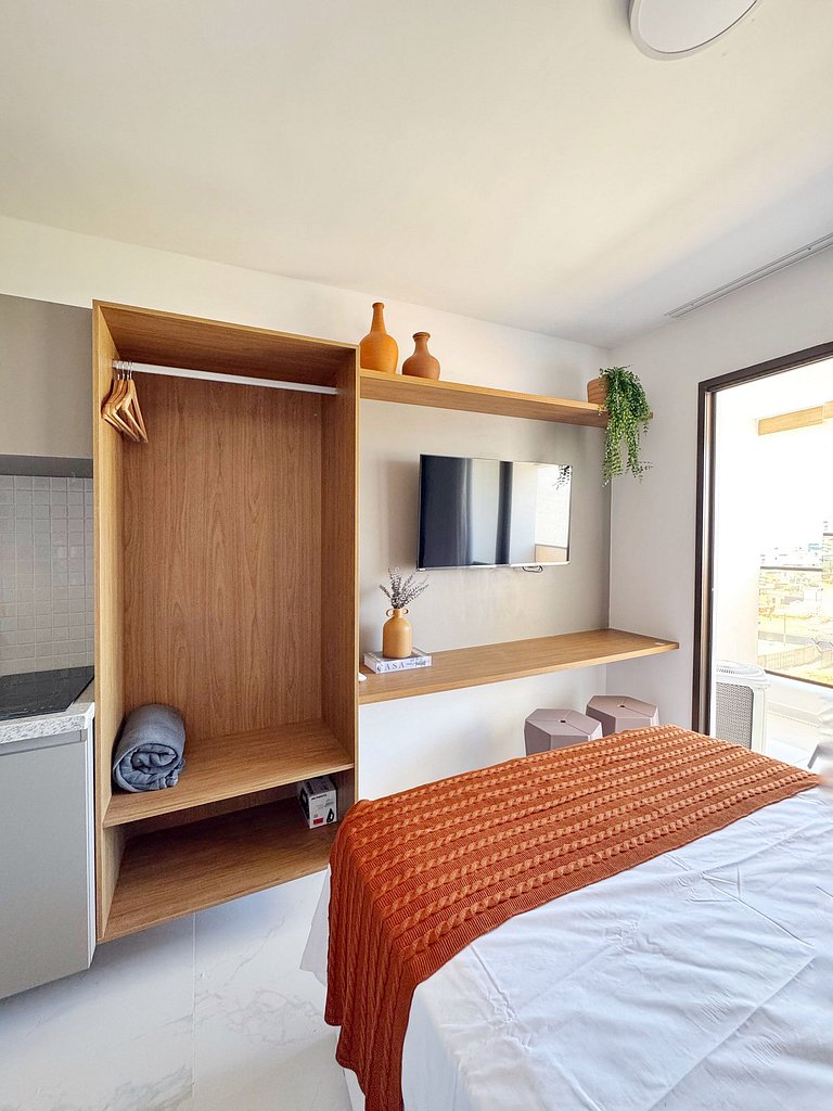 SC530 Studio com varanda e vista mar by VLV Stays